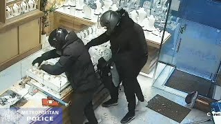 Dramatic smashandgrab robbery at west London jewellers is caught on CCTV [upl. by Bahr]