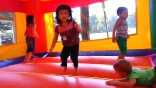 Kids Play in Inflatable Bounce House [upl. by Ogeid]