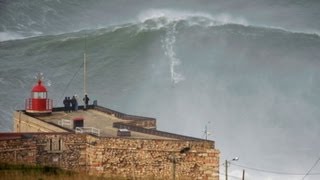 Caught On Tape Daredevil Surfer Tackles Largest Wave Ever [upl. by Yekram]