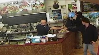 Watch Store Clerk Completely Ignore An Armed Robber To Help Customers [upl. by Perkin]